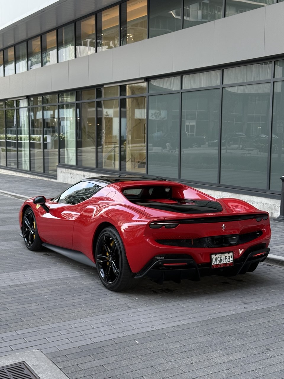 Glossy red sports car after a full detail