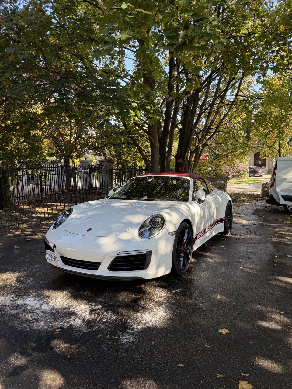 White sports car after exterior mobile detailing